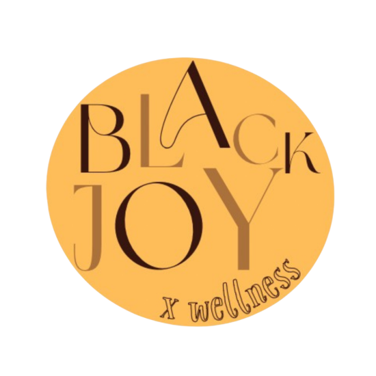 black joy logo, yellow circle logo with text that sits inside reading black joy x wellness